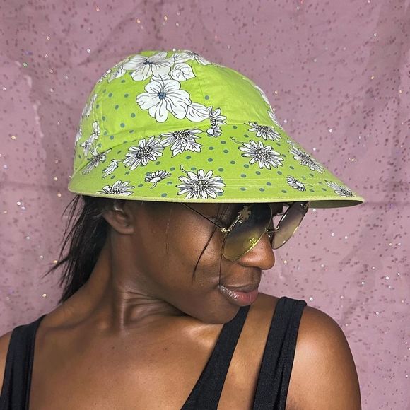 Lime green with flowers and reversible! Has a little boat on the plain side. Bet - Picture 2 of 4